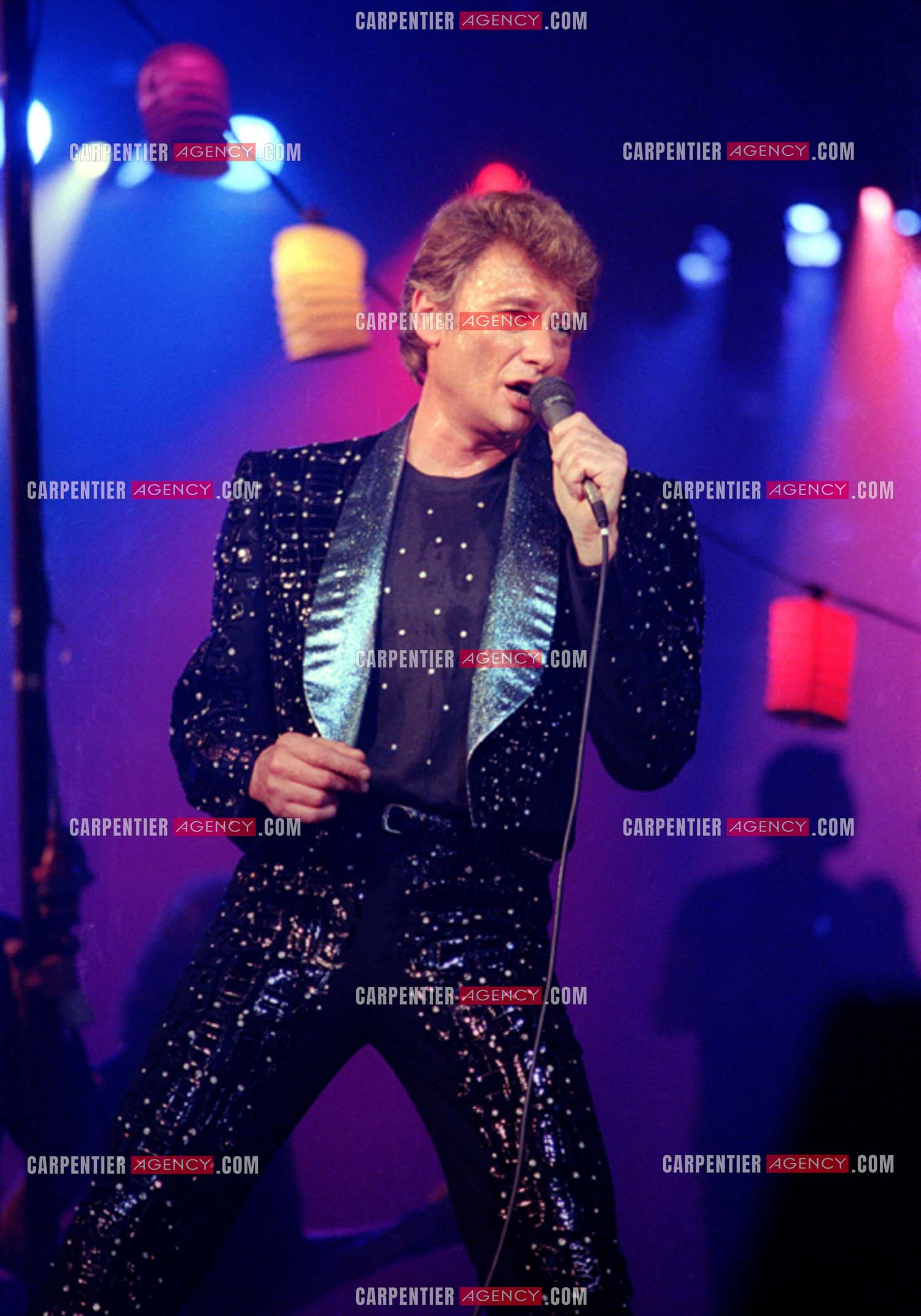 Le chanteur Johnny Hallyday lors de ses concerts au Zénith de Paris du 26 oct 1984 au 08 janvier 1985.   ( Exclusif )