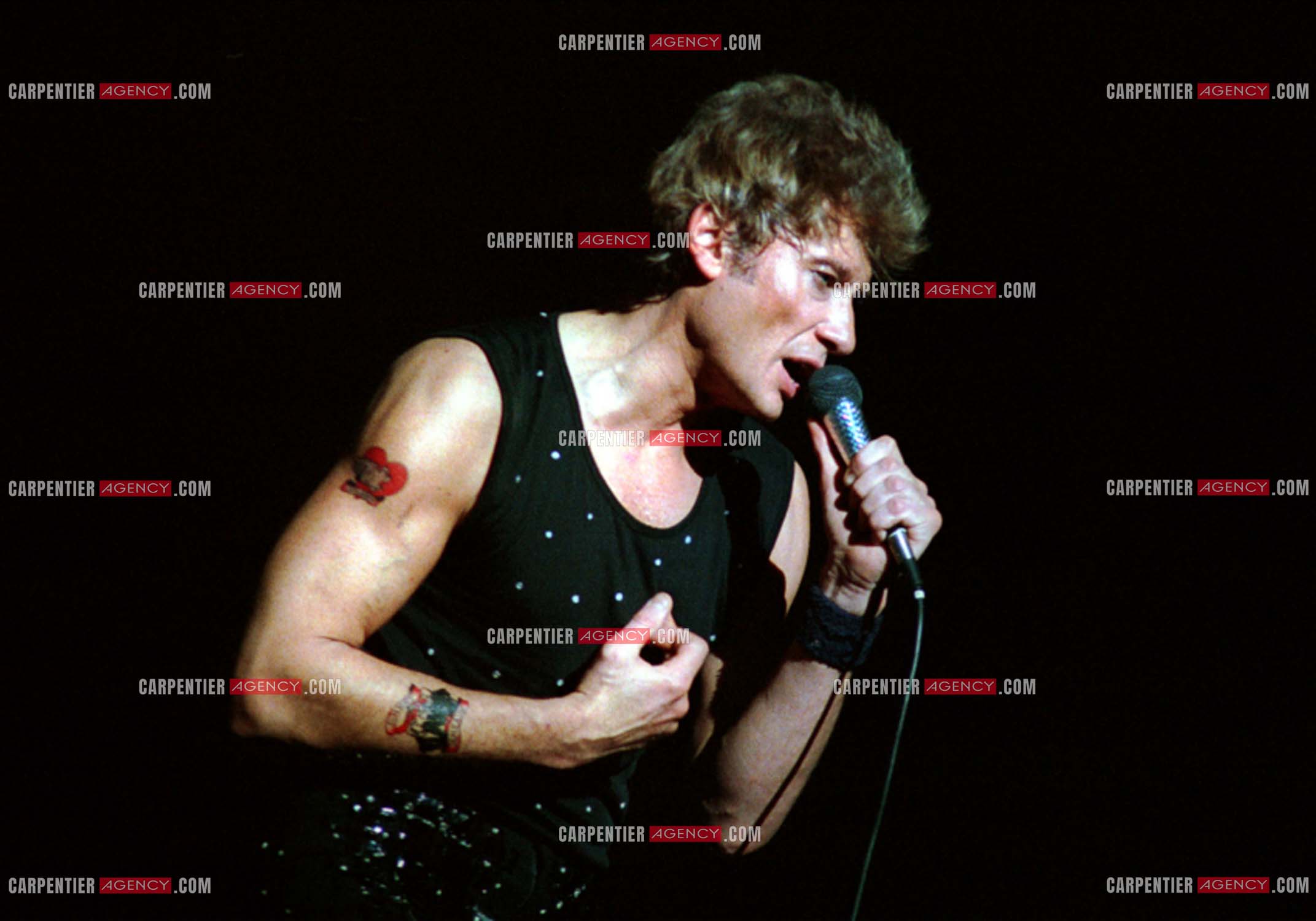 Le chanteur Johnny Hallyday lors de ses concerts au Zénith de Paris du 26 oct 1984 au 08 janvier 1985.   ( Exclusif )