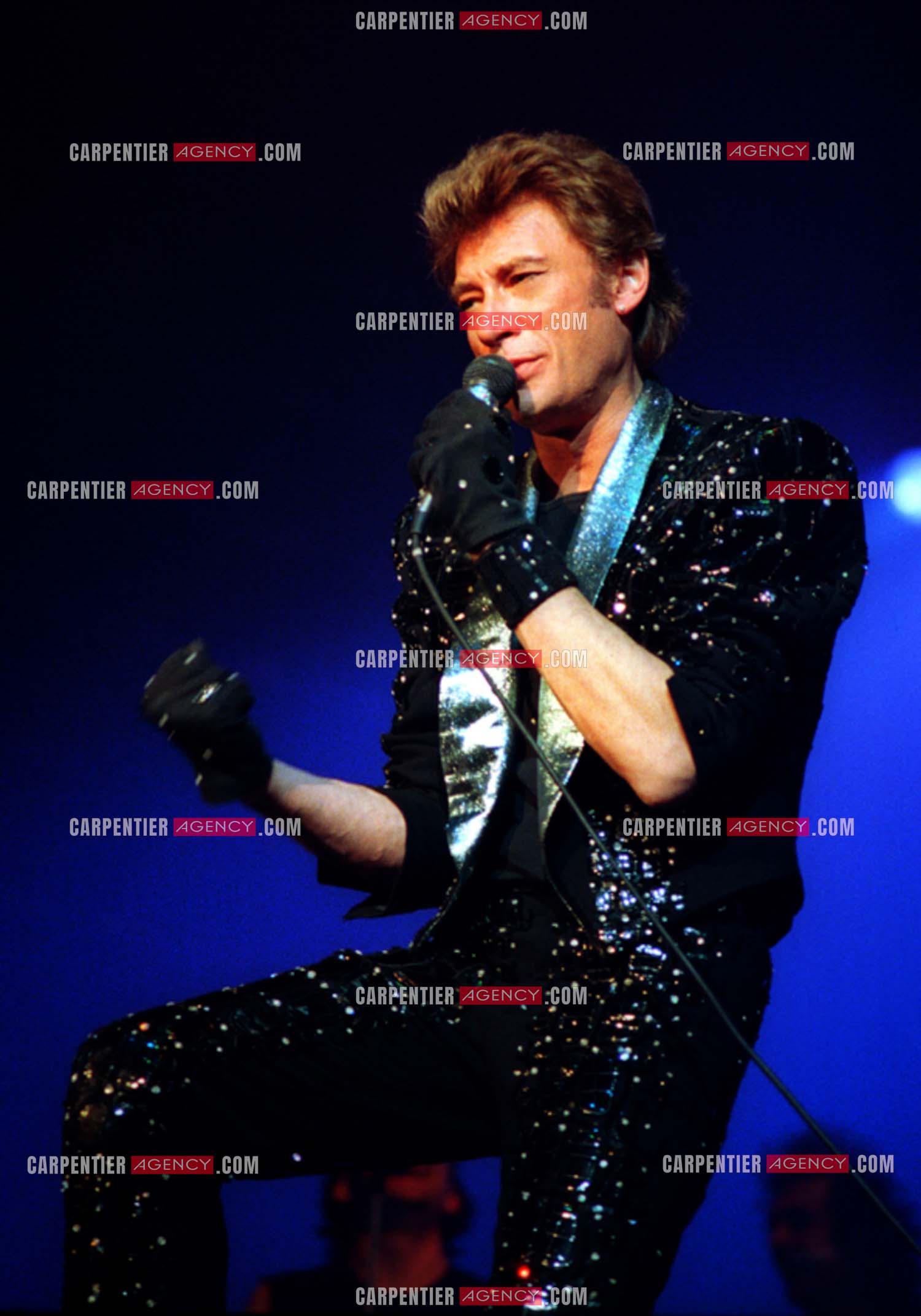 Le chanteur Johnny Hallyday lors de ses concerts au Zénith de Paris du 26 oct 1984 au 08 janvier 1985.   ( Exclusif )