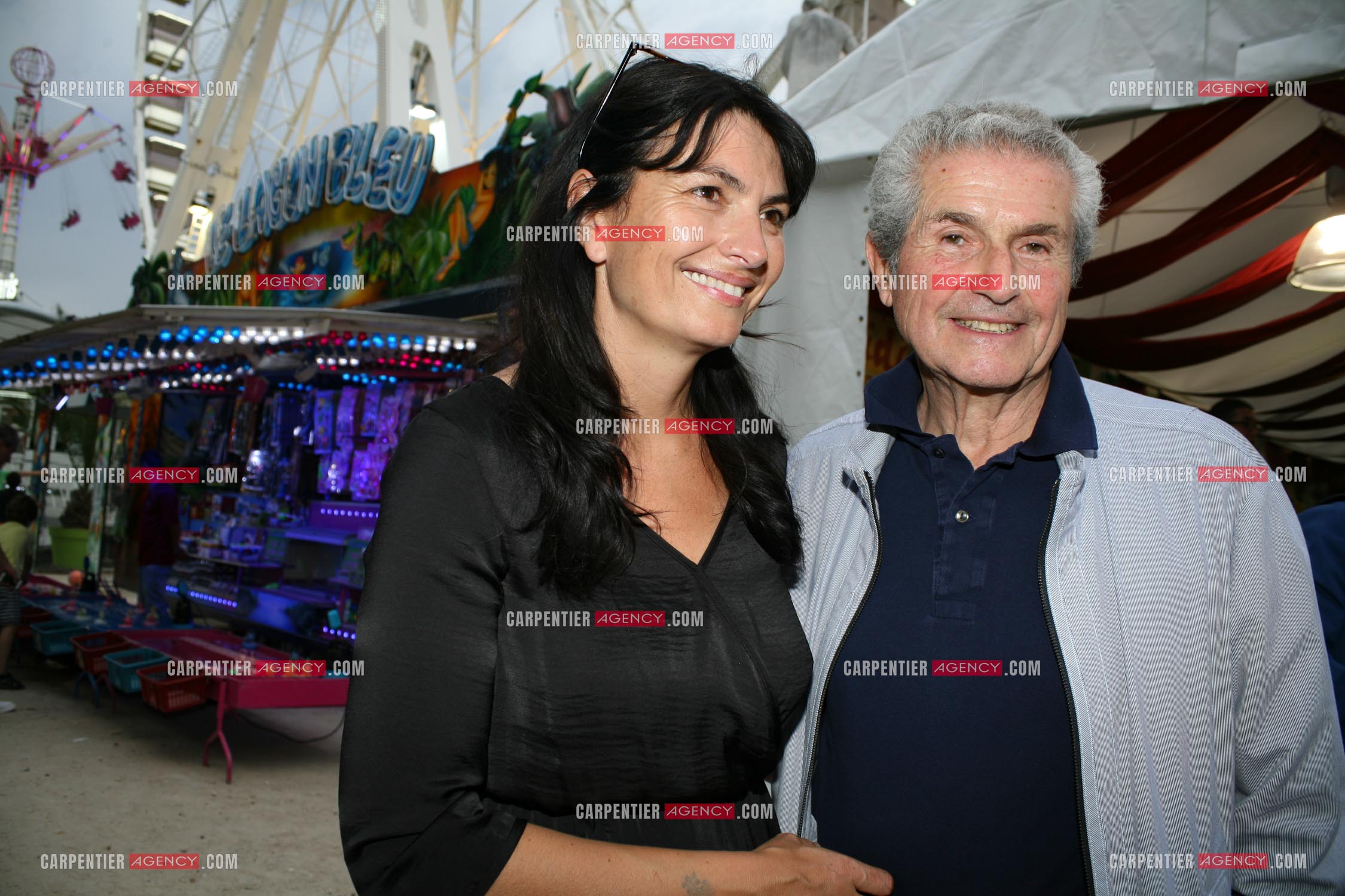 Claude Lelouch et sa compagne Valérie à la foire du Trône à Paris.                  ( Exclusif )