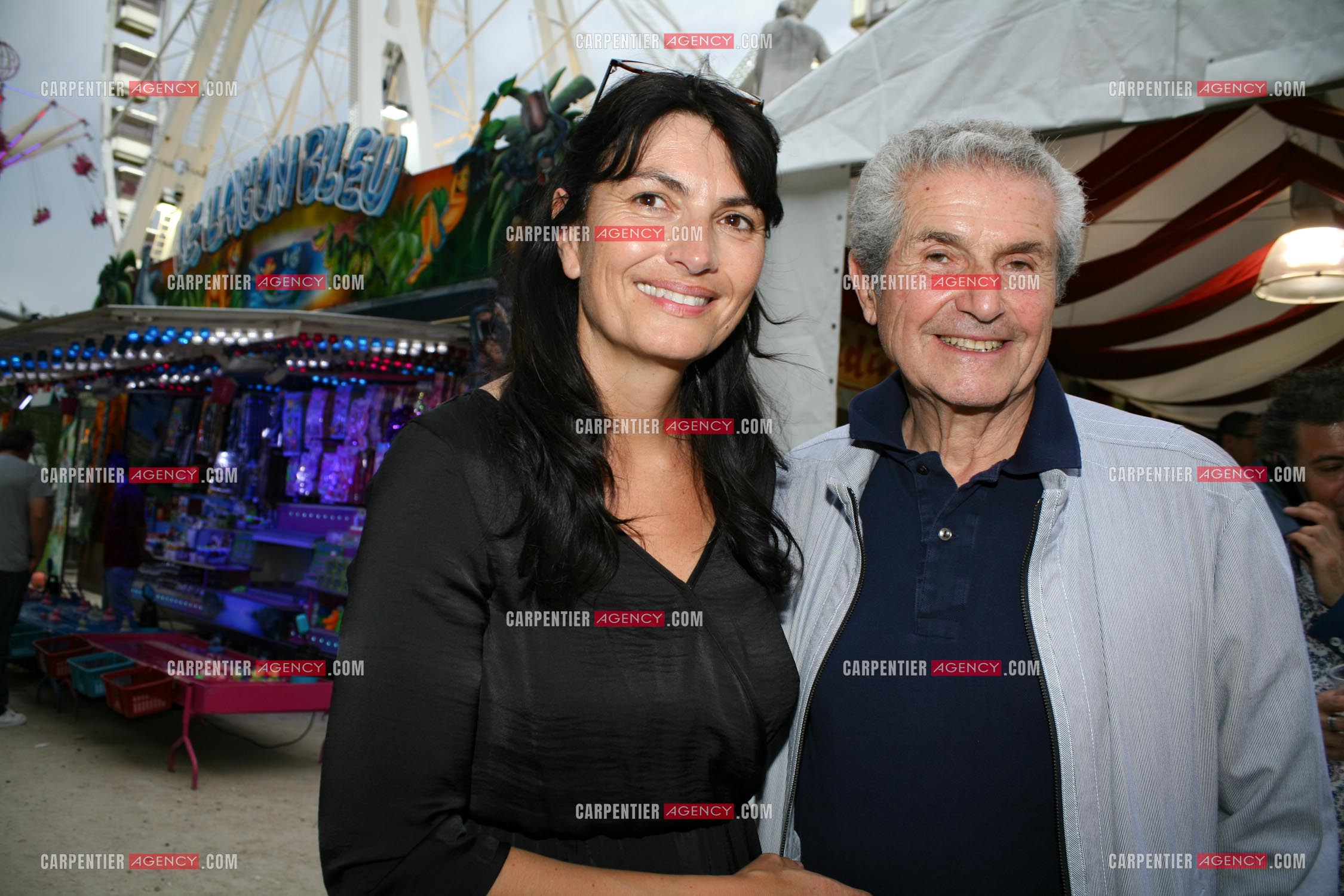 Claude Lelouch et sa compagne Valérie à la foire du Trône à Paris.                  ( Exclusif )