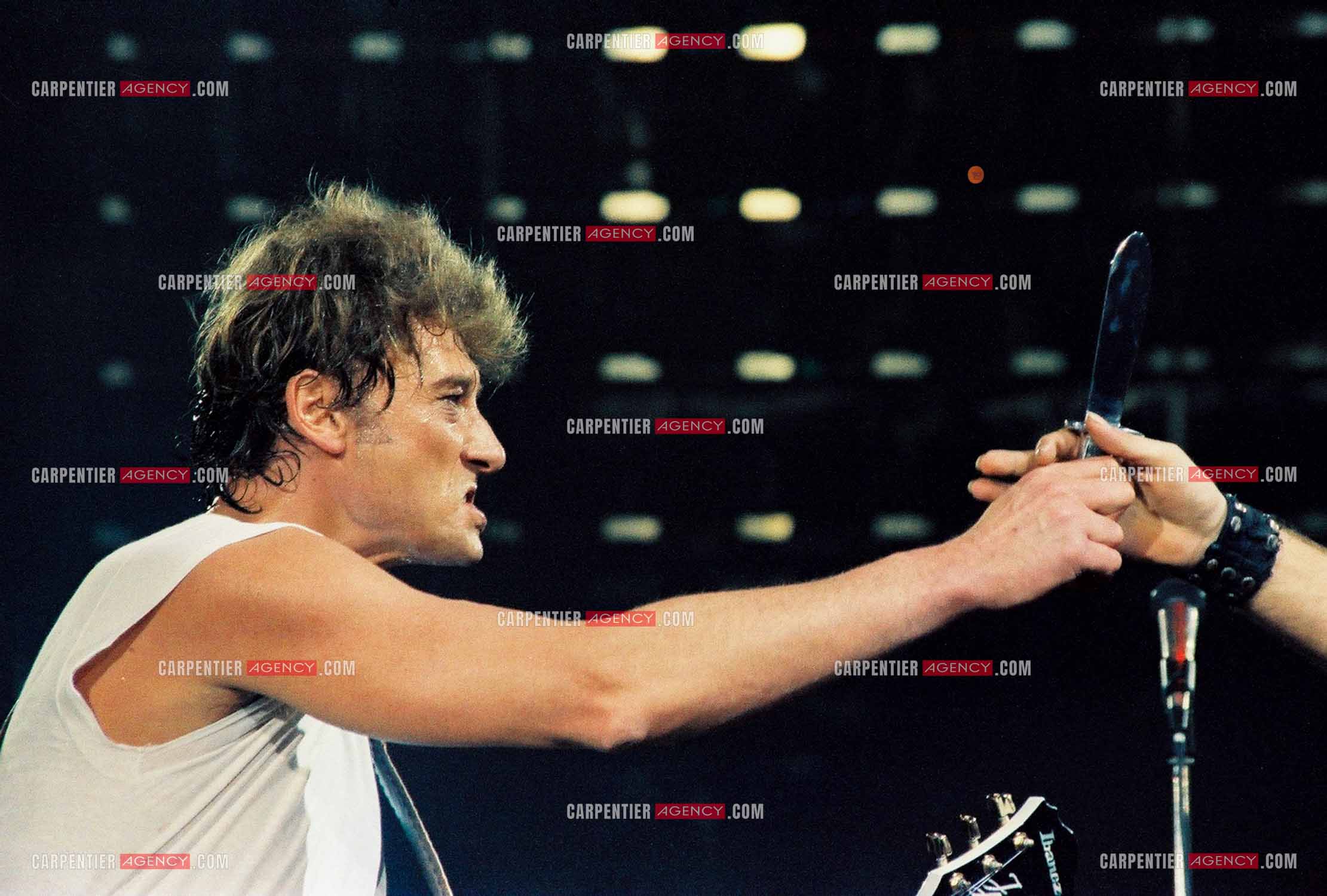 Le chanteur Johnny Hallyday en concert au Zénith de Paris du 26 octobre 1984 au 8 janvier 1985.  ( Exclusif )
