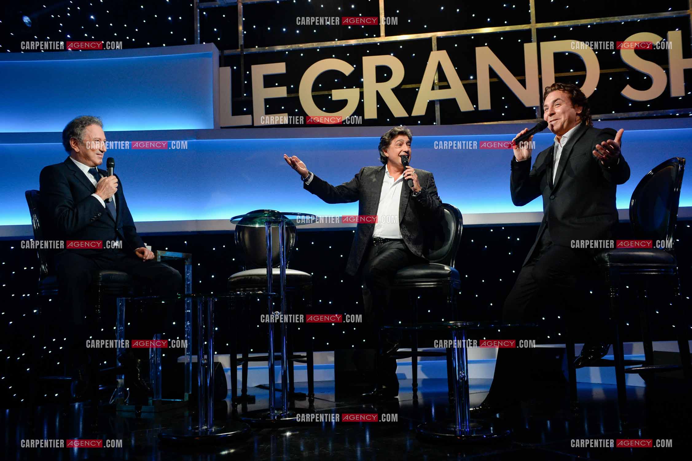 L'animateur Michel Drucker reçoit le ténor Roberto Alagna et le chanteur Frédéric François pour son émission “ Le Grand Show “.