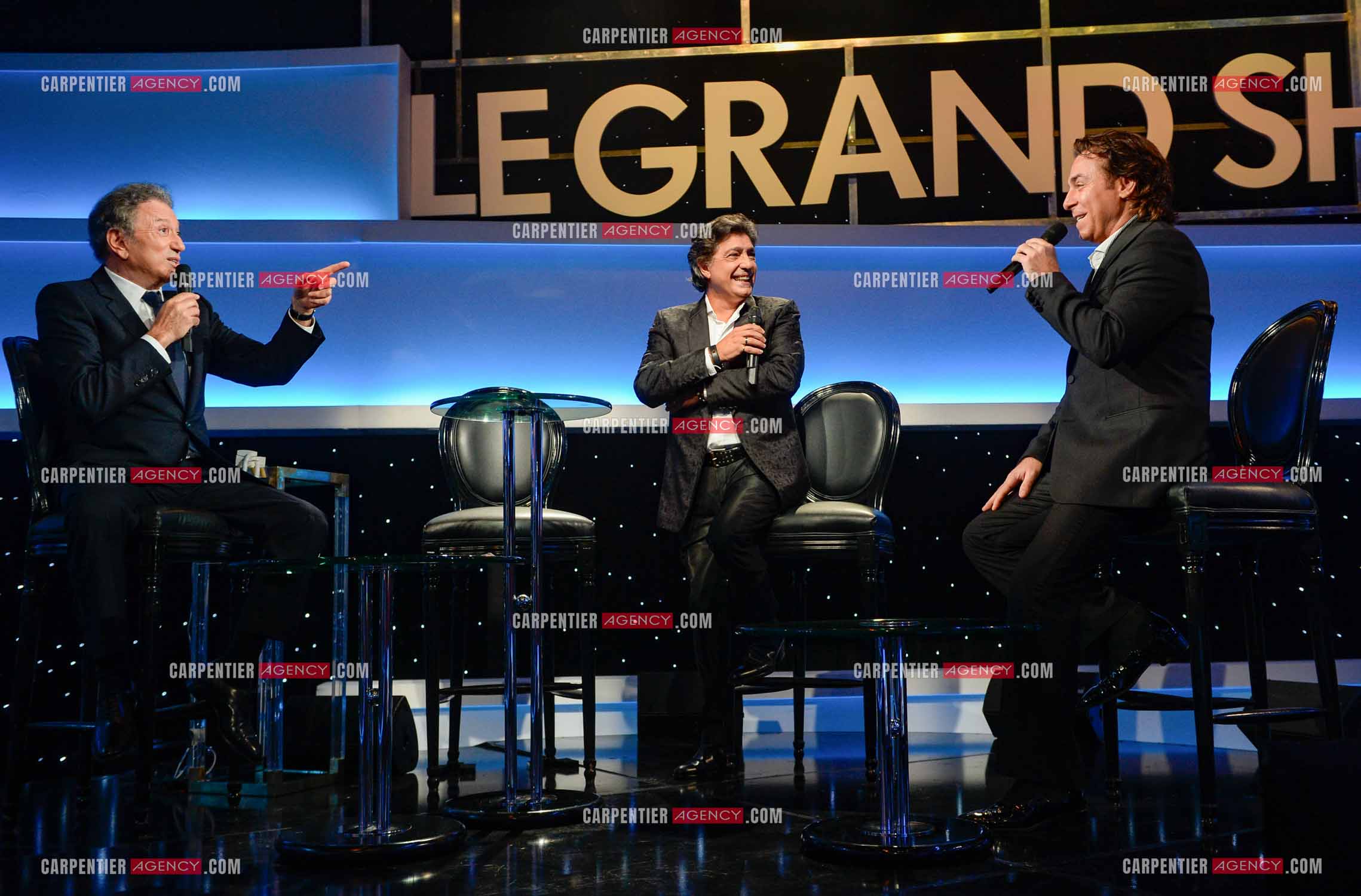 L'animateur Michel Drucker reçoit le ténor Roberto Alagna et le chanteur Frédéric François pour son émission “ Le Grand Show “.