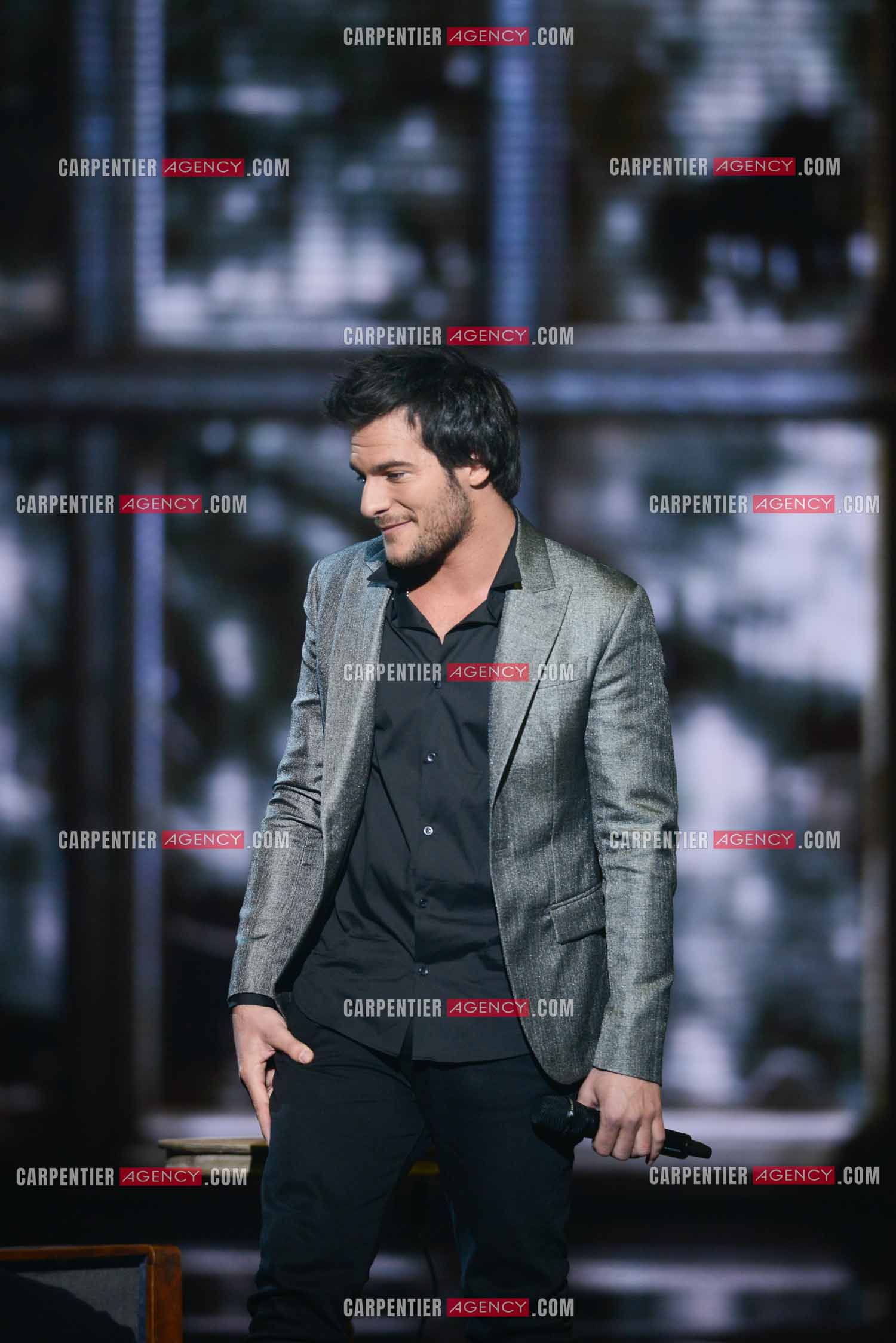 Le chanteur Amir en tant que candidat à l'émission The Voice en 2014.