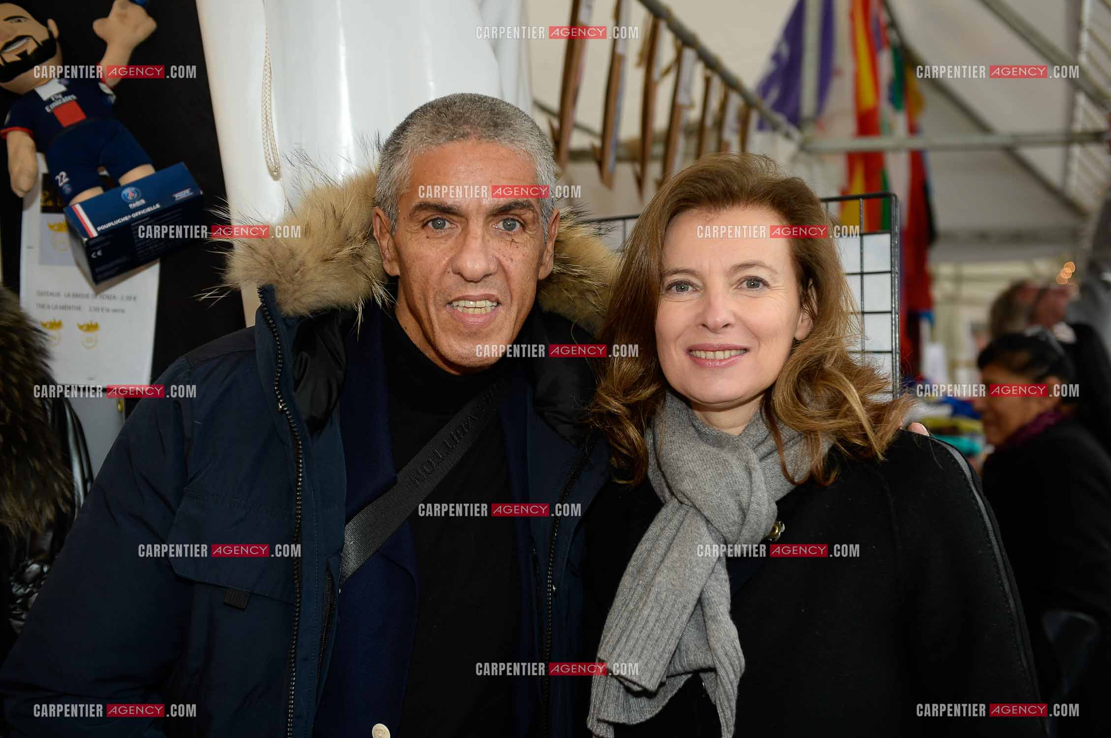 Secours Populaire au marche de Noel sur les Champs Elysees le dimanche 21 Decembre 2014. Sur la photo Valérie Trierweiler et Samy Naceri.