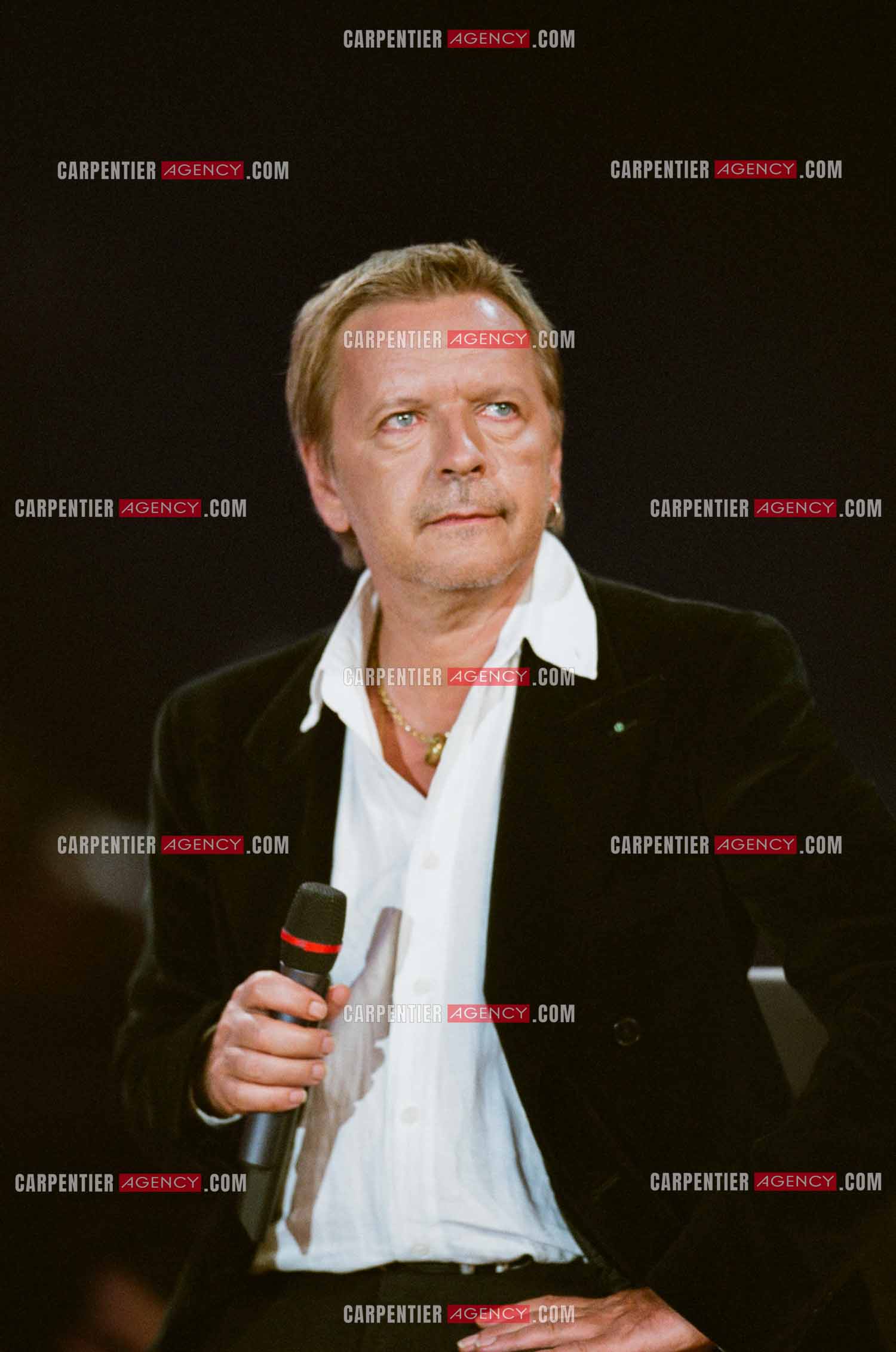 Le chanteur Renaud en concert.