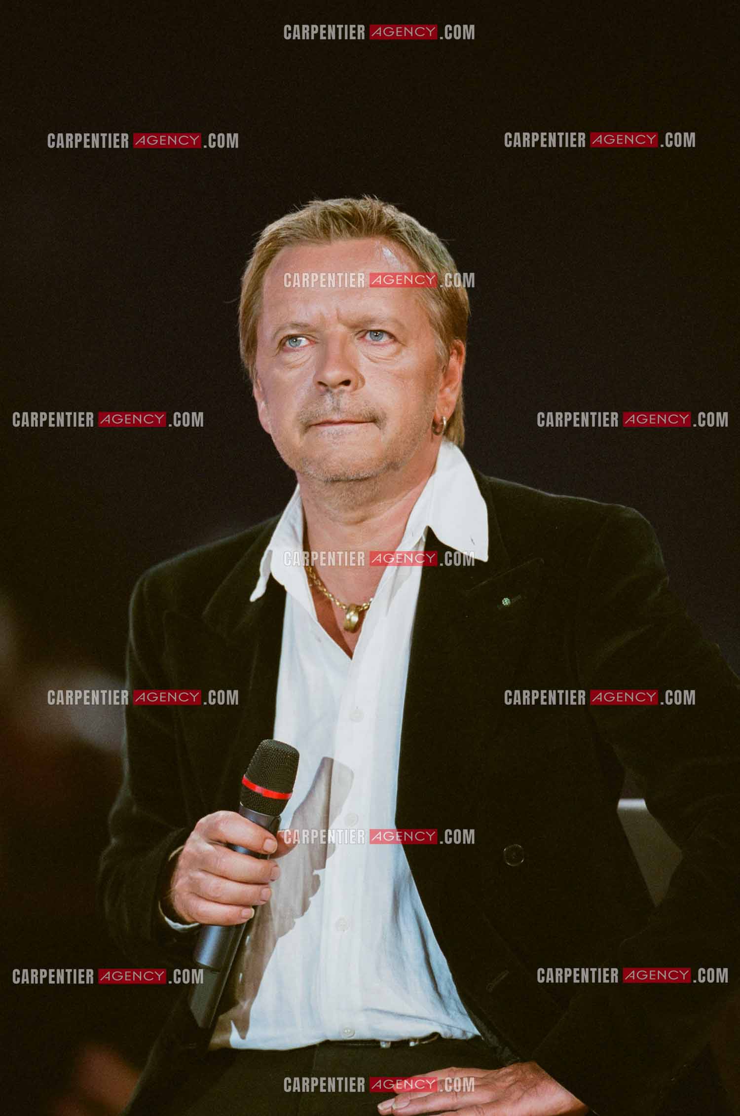 Le chanteur Renaud en concert.