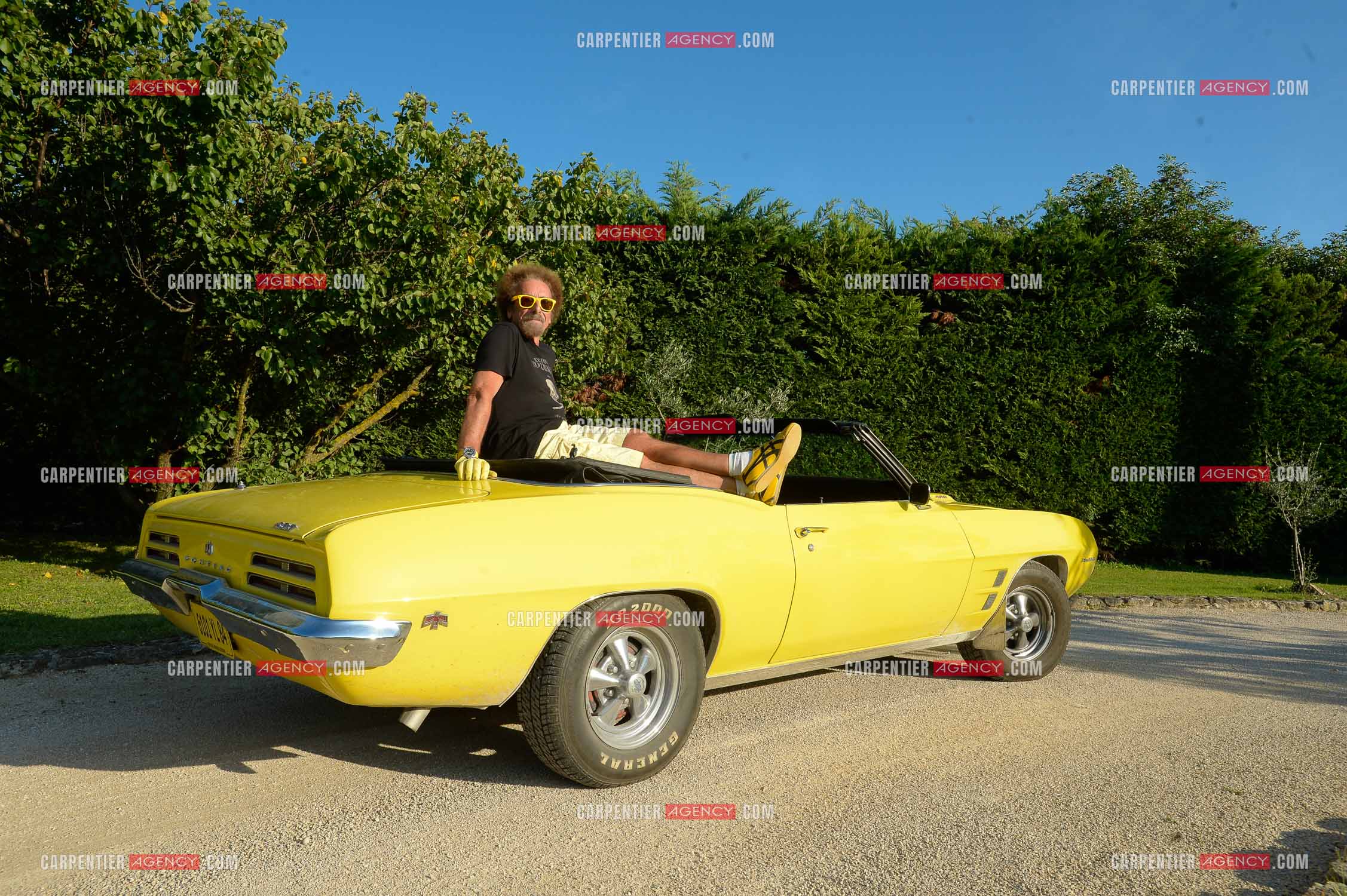 Jean Schultheis et sa passion des voitures. Ici, avec sa Mustang a Cavaillon le 12 Aout 2014.  ( Exclusif )