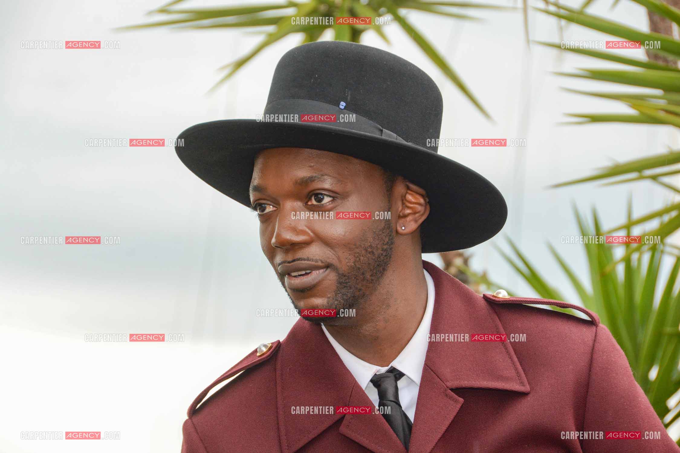 Ouverture du  77ème Festival de Cannes du 14 au 25 mai 2024. Le rappeur et réalisateur belge Baloji lors du photocall.