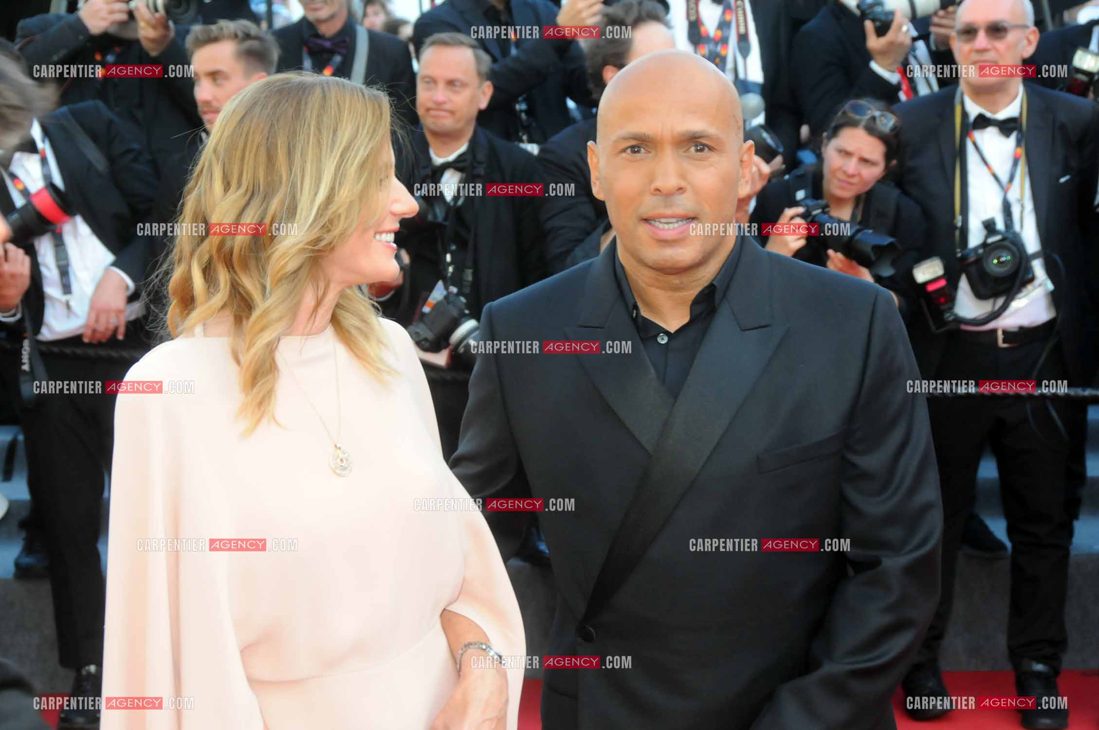 Ouverture du  77ème Festival de Cannes du 14 au 25 mai 2024. Montée des marches du film “ Emilia Perez “. Eric Judor et sa femme.