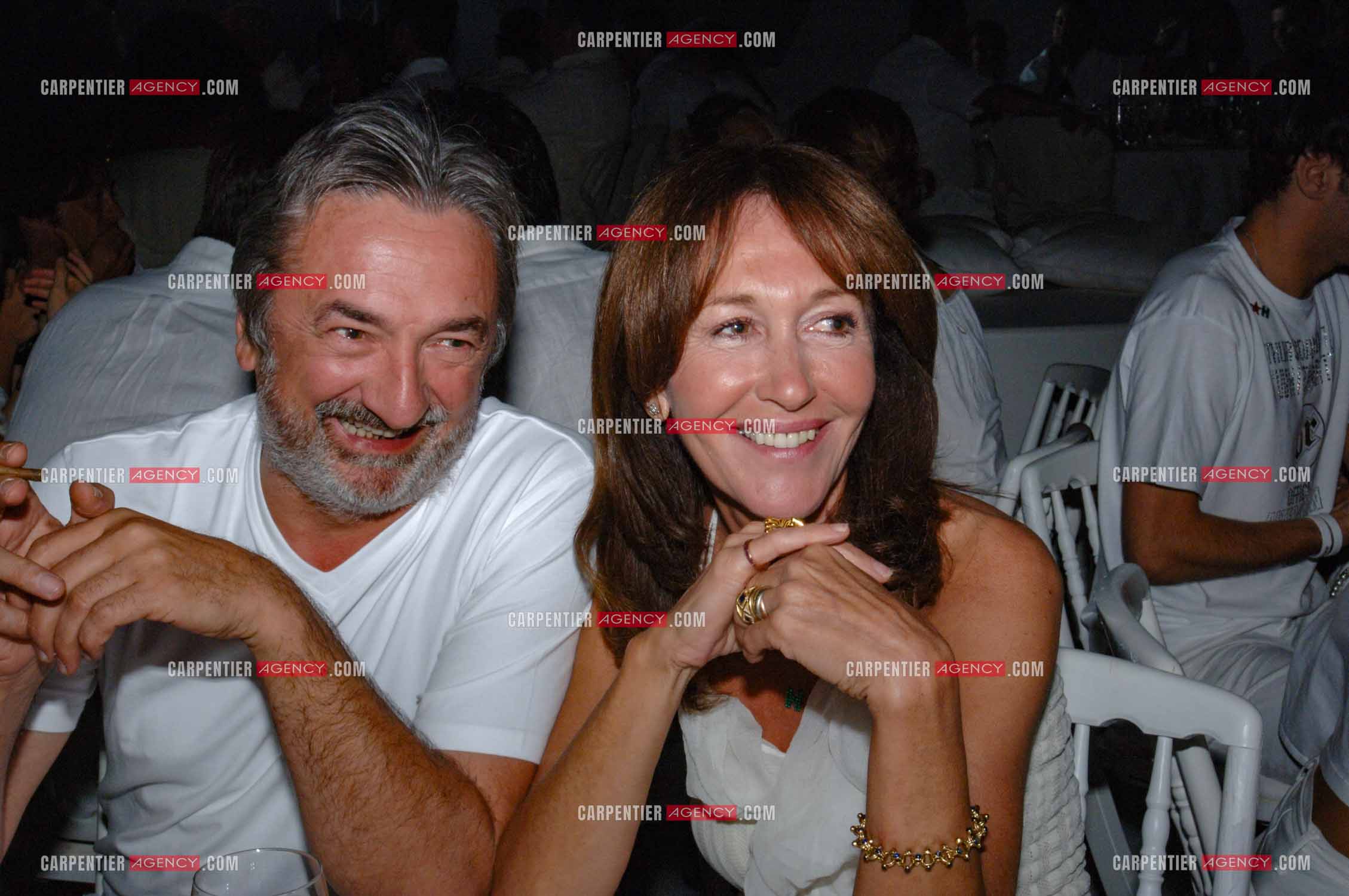 Soirée Blanche au Moulin de Ramatuelle en 2005. Le metteur en scène Antoine Boville et Christine Deviers-Joncour.    ( Exclusif )