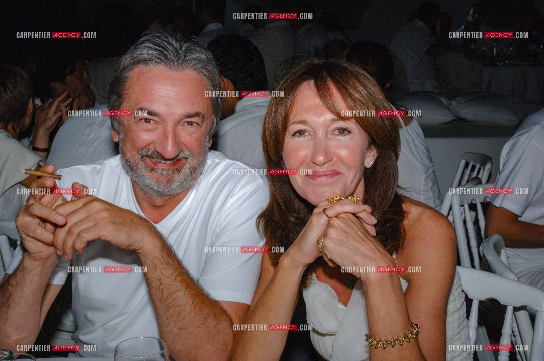 Soirée Blanche au Moulin de Ramatuelle en 2005. Le metteur en scène Antoine Boville et Christine Deviers-Joncour.    ( Exclusif )