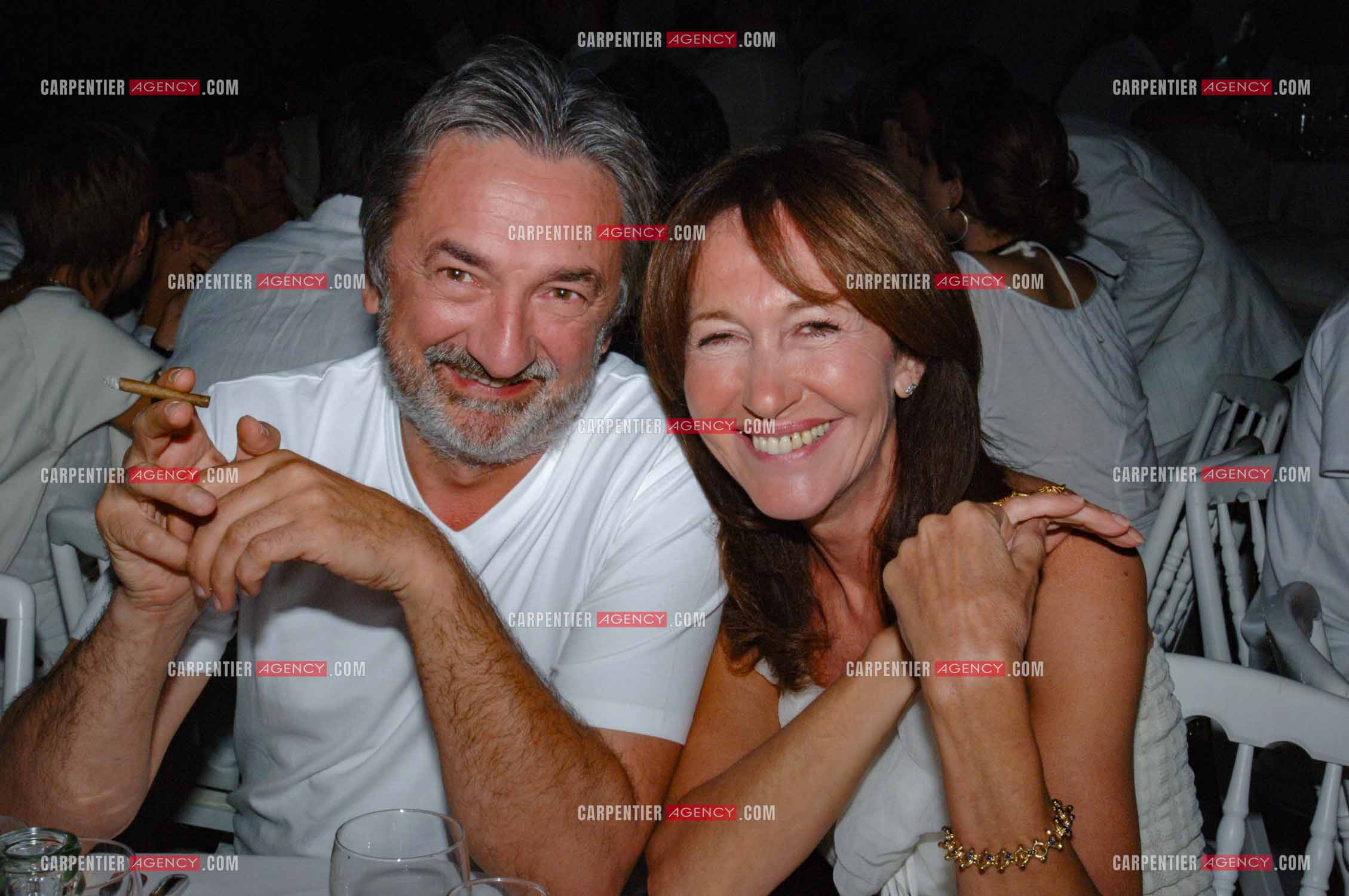 Soirée Blanche au Moulin de Ramatuelle en 2005. Le metteur en scène Antoine Boville et Christine Deviers-Joncour.    ( Exclusif )