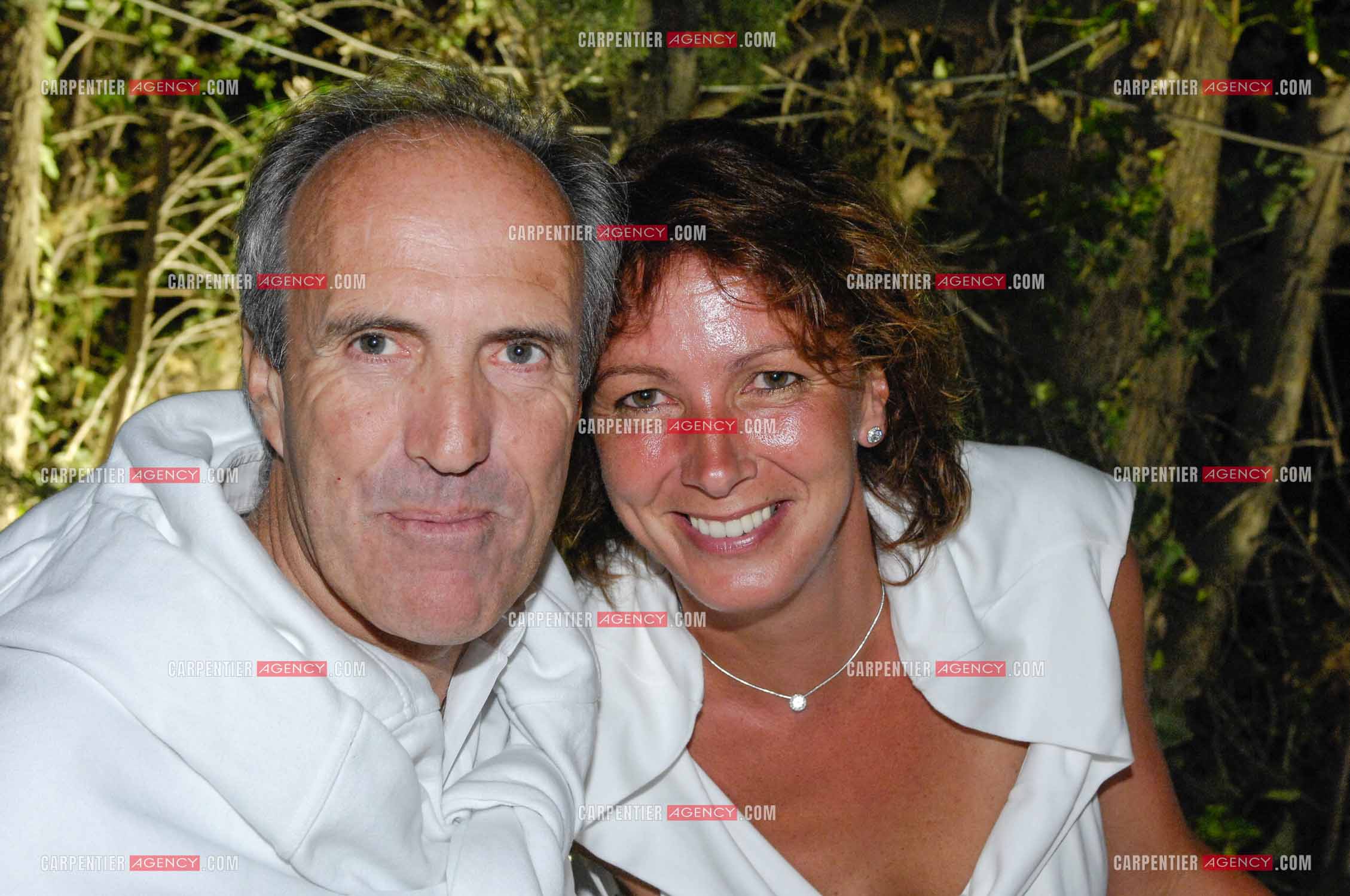 Le navigateur Marc Pajot et sa femme à la soirée blanche de St Tropez en 2007.   ( Exclusif )