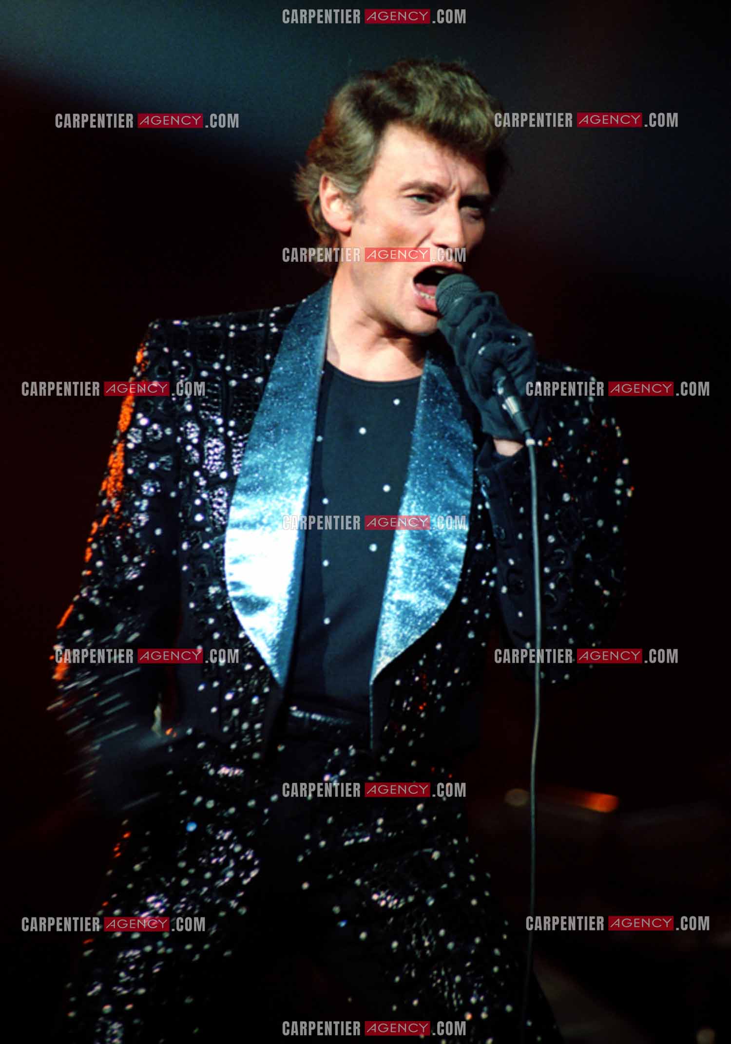 Le chanteur Johnny Hallyday en concert au Zénith de Paris du 26 octobre 1984 au 8 janvier 1985. ( Exclusif )