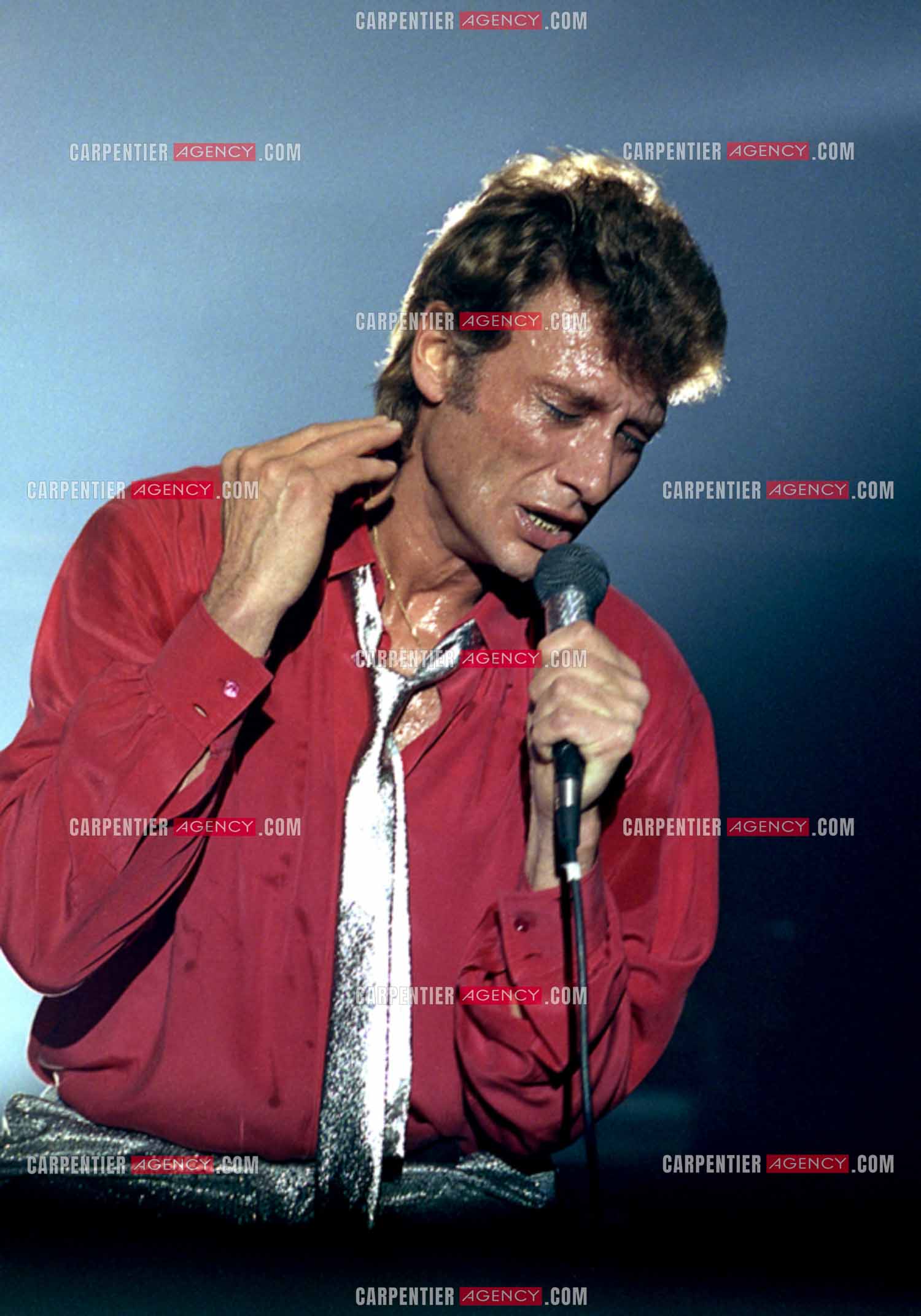 Le chanteur Johnny Hallyday lors de ses concerts au Zénith de Paris du 26 oct 1984 au 08 janvier 1985.   ( Exclusif )