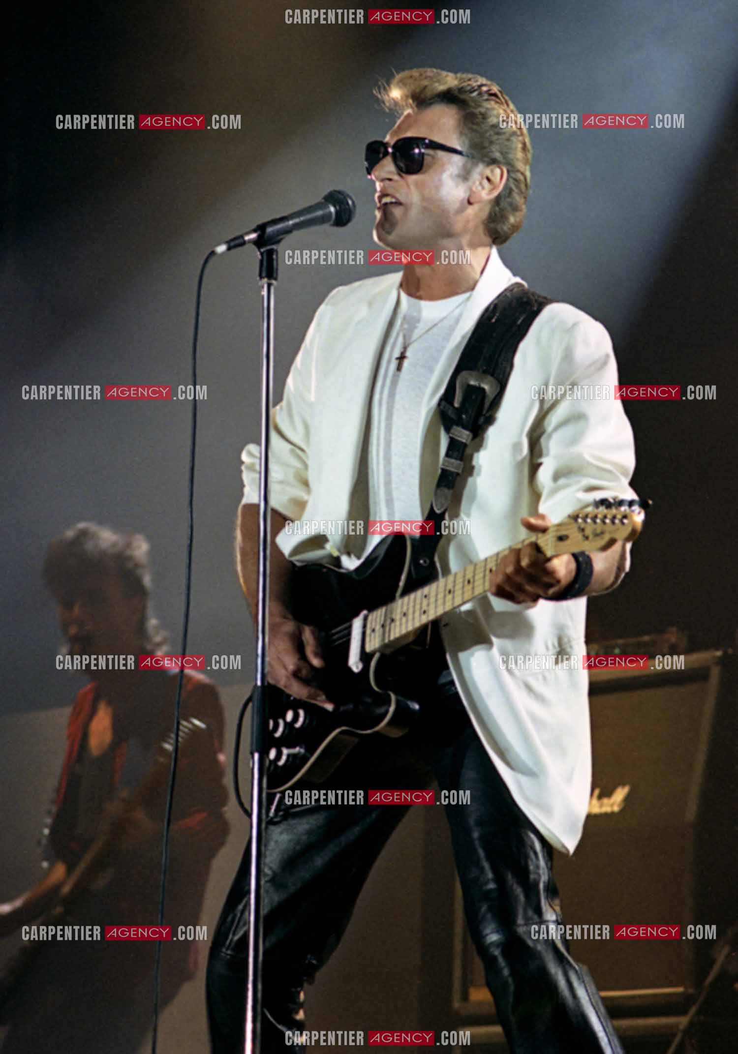 Le chanteur Johnny Hallyday lors de ses concerts au Zénith de Paris du 26 oct 1984 au 08 janvier 1985.   ( Exclusif )