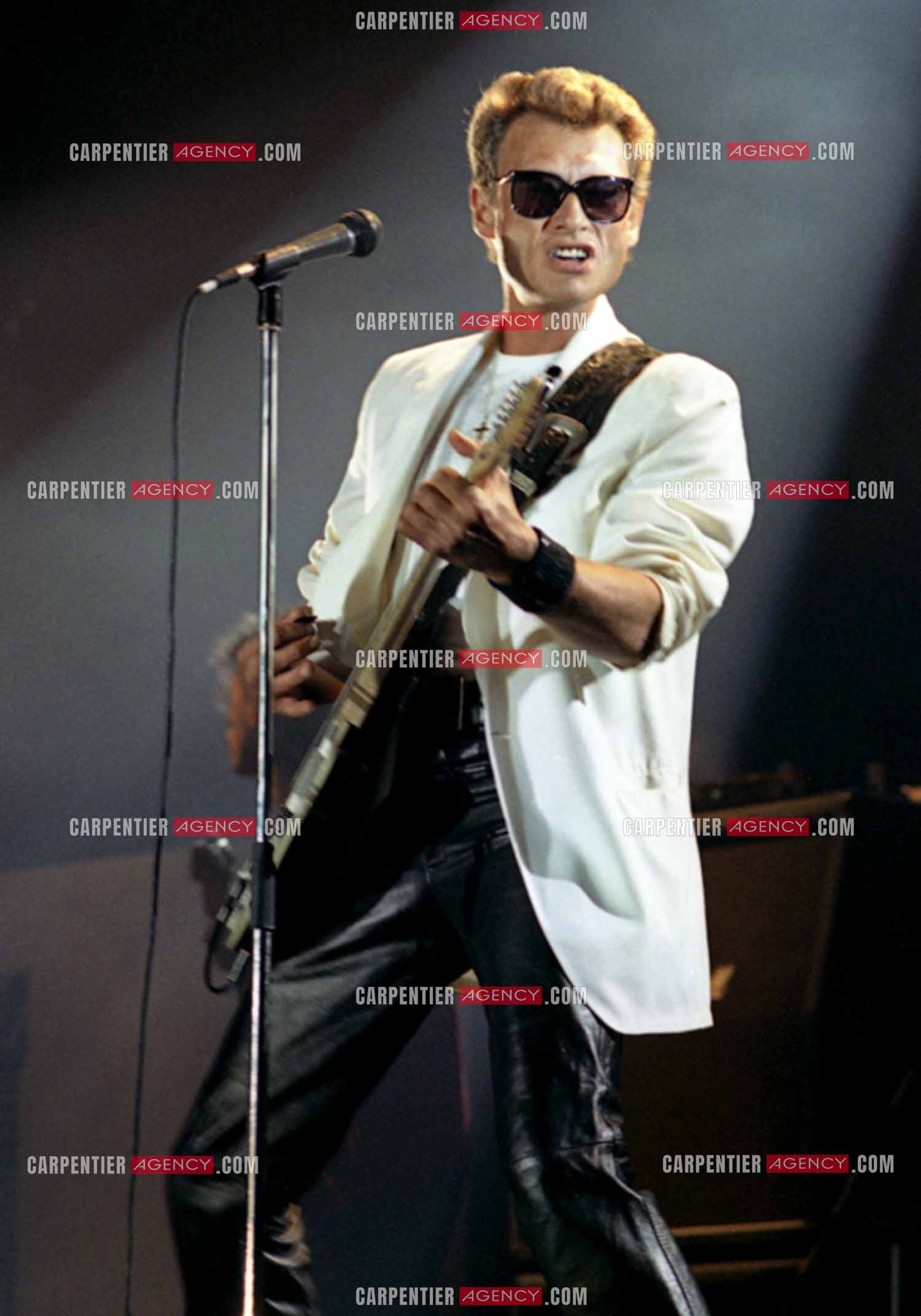 Le chanteur Johnny Hallyday lors de ses concerts au Zénith de Paris du 26 oct 1984 au 08 janvier 1985.   ( Exclusif )