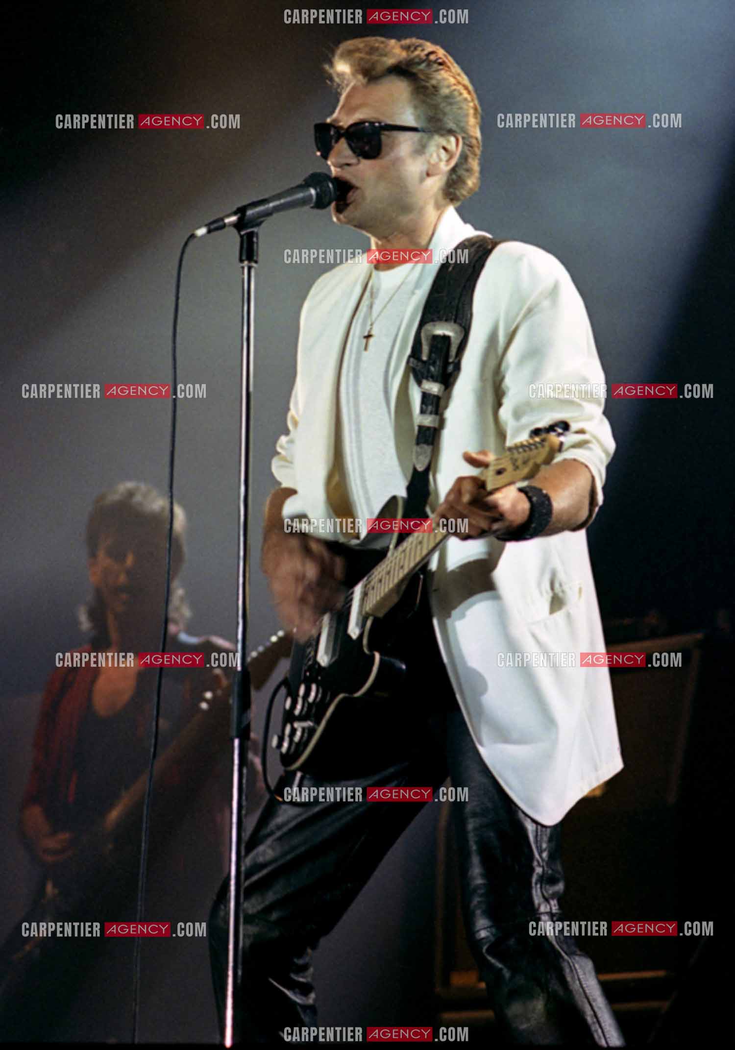 Le chanteur Johnny Hallyday lors de ses concerts au Zénith de Paris du 26 oct 1984 au 08 janvier 1985.   ( Exclusif )